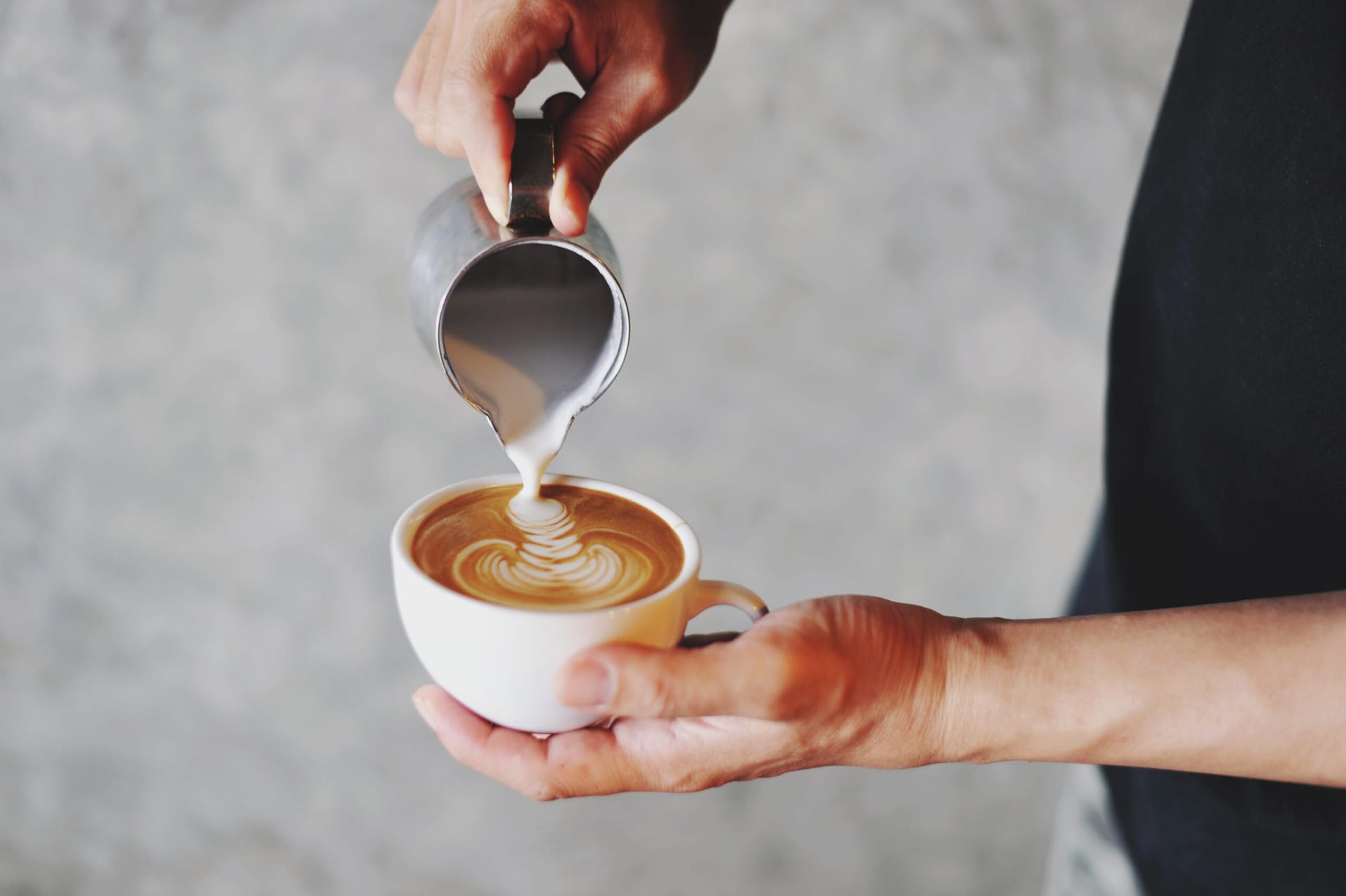 Latte art being poured