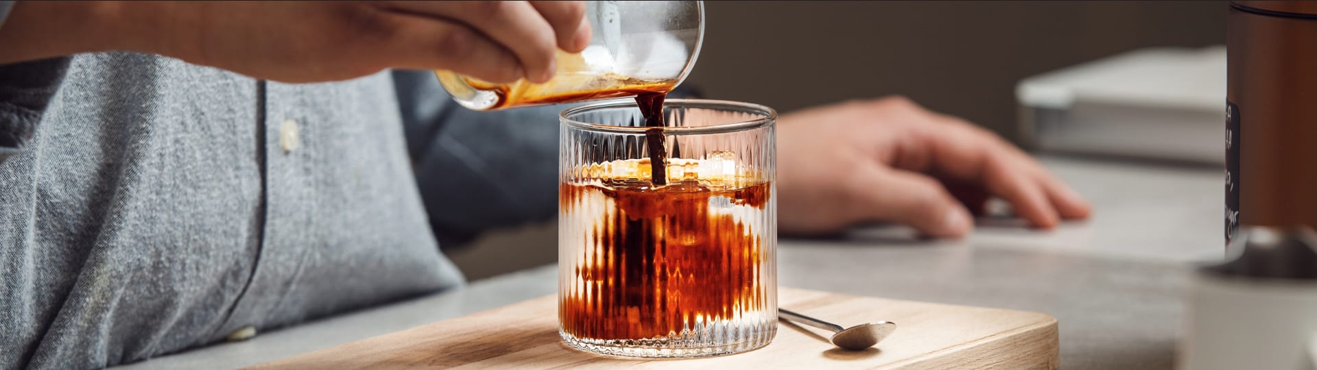 Coffee being poured over ice
